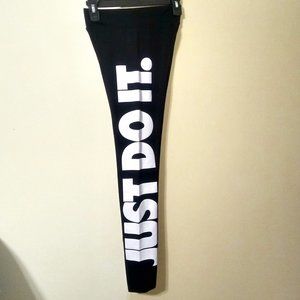 Gently Used Nike Sportswear Leggings with the "Just Do It." Logo on the Left Leg